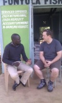 Ashley Palmer-Watts meeting Saul Odenyo, one of Farm Africa's  Aqua Shop owners