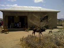 Teresia's new home she has built for her family with the income from her increased sesame sales