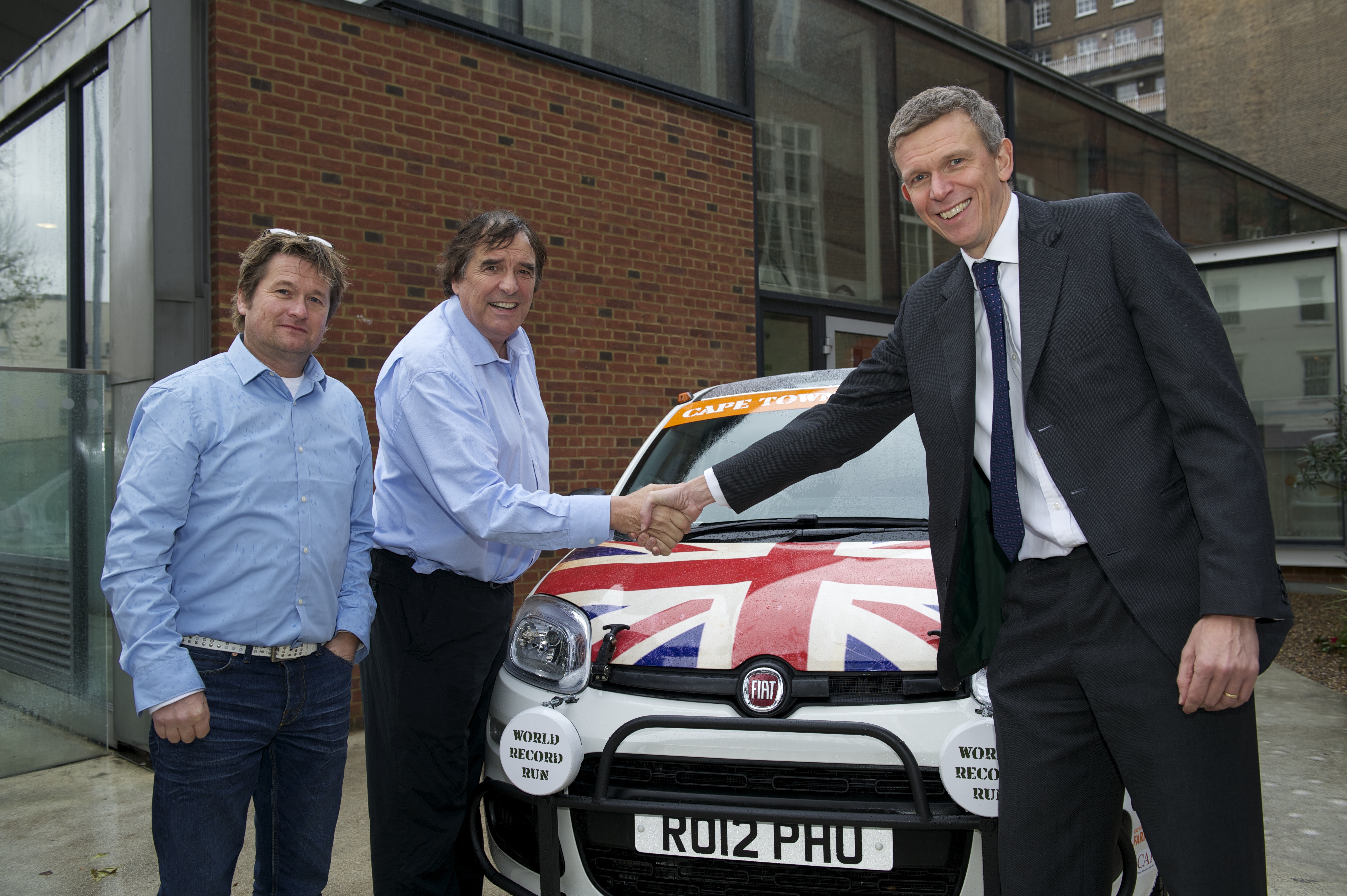 Nigel Harris, Farm Africa Chief Executive shaking Philip's hand