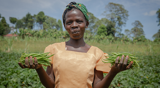Susan Khamala working on Rachel Njorgoge's farm 