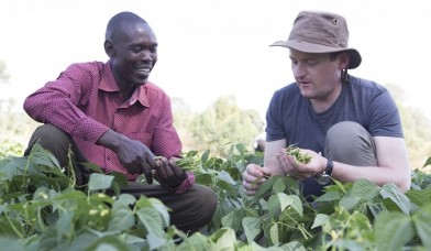 Jonathan Neale, Managing Director of Buying at Aldi UK meeting farmer Joseph Kiplagat on his green bean farm.