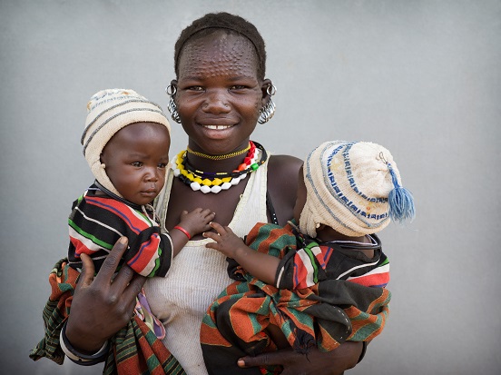 Regina with her twin baby girls. 