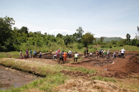 The ladies working hard at the pond site