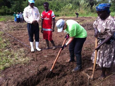 Judith Batchelar and Helen from the Afula Women's group symbolically break the earth and the dig begins!