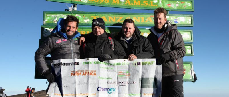 The chefs at the summit of Mount Kilimanjaro