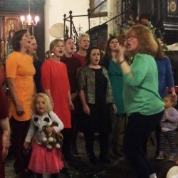 Pram Chorus performing at the Farm Africa carol concert