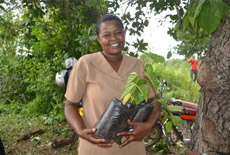 Eunice Jones with her passion fruit plant
